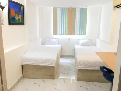 Tweepersoons- of tweelingkamer met badkamer — Baoanh Hostel